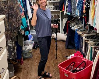 ANN PUTTING THE CLOSET TOGETHER.