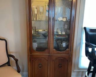 One of two matching lit cabinets