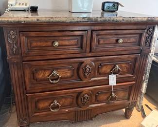 One of two matching nightstands