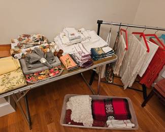 Lot's of lovely tablecloths  and placemats