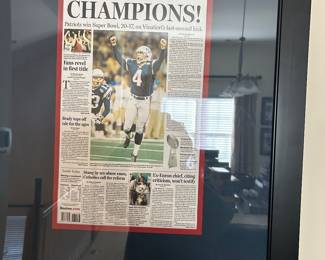 Framed Front Page of the Boston Globe  Commemorating the New England Patriots 2002 Super Bowl Win.