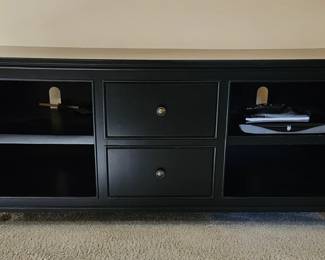 Nice newer entertainment center with two usable drawers - black