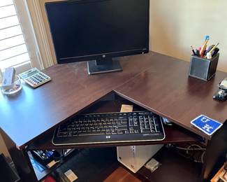 Computer desk...small size for small spaces, bottom shelf, very functional and fits right in corner...