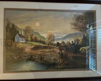 There are several pieces of signed/numbered art prints throughout this lovely home.