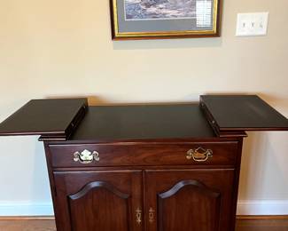 This Henkel-Harris Bar Cart is Perfection!  Flip top server boards are in like new condition, this piece is perfect for dining room, Man Cave, Den...a lovely functional piece to add to your home's comfort!