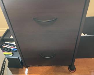 Brown two drawer file, great for storage in office.