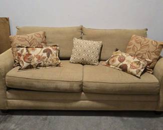 Tan Fabric Sofa With Matching Pillows