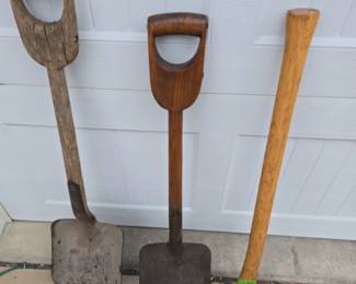 Antique wooden handled shovels