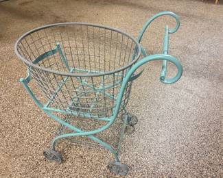 Teal vintage rolling laundry cart