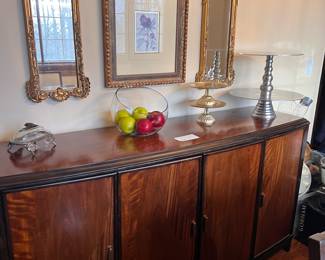 This is a Bernhardt dining room credenza with felted silverware drawer built in. Wood has burled effect. This piece available for pre-sale, call 973-412-5750