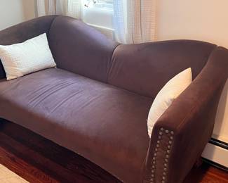 Another smaller sized interesting sofa. The entire home has been carefully curated over the years. This is why we go to sales.