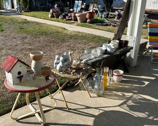 Plants, pots , patio furniture and yard art. 