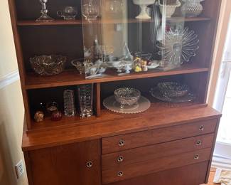 Mid century modern (MCM) cabinet & hutch with removable glass doors filled with glass & crystal.