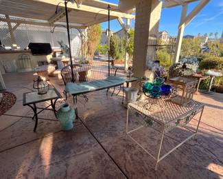 Outdoor plant hangers, loveseat & end tables, plus urns & vases