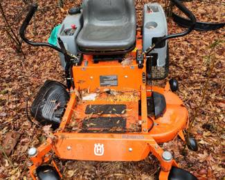 Husqvarna zero turn mower.  Not running, but can be repaired or used for parts.