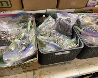 Large assortment of knobs and handles from antique to modern