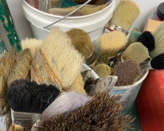 Large assortment of paint brushes for painting and waxing