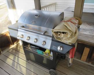 Lot 209. Grill Master BBQ, tank, manual, and accessories in excellent condition. (Pssst. It will go for way more in June.)