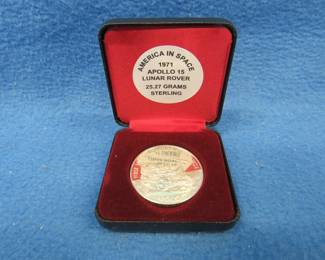 Lot 165. America in Space 1971 Apollo 15 sterling silver medallion. 25.57 grams. No sales tax on this item.