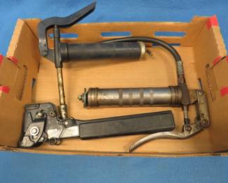 Lot 361. Two grease guns and a stapler