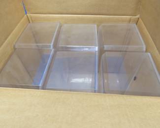 Lot 101. Full box of six used display boxes. 15 1/2" x 7" x 6 1/2". Includes six cardboard sleeves.