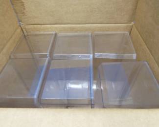 Lot 99. Full box of six used display boxes. 15 1/2" x 7" x 6 1/2". Includes six cardboard sleeves.
