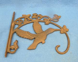 Lot 194. Hummingbird cast-iron plant hanger