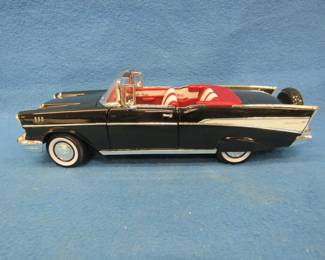 Lot 170. Road Signatures 1957 Chevrolet Bel Air convertible. 1:18 scale die-cast car.