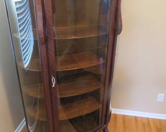 Lot 219. Antique curved glass locking china cabinet in excellent condition