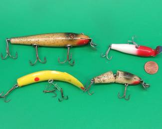 Lot 185. Vintage CCBC wooden Pikie with glass eyes, jointed wooden Pikie with painted eyes, Flatfish, and a 2 1/4" plastic Pikie