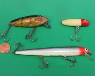 Lot 183. Old wooden Heddon 2 1/2" River Runt with glass eyes, Heddon 4 3/4" Wood Cobra, and a Paw Paw 1 5/8" Groove Head Wobbler
