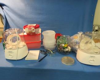 Lot 287. Two Cuisinart ice cream/yogurt makers, Rubbermaid bowls NIP, Cookie cutters, Plastic silverware.