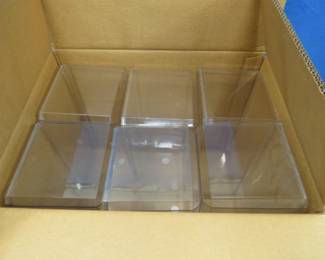 Lot 100. Full box of six used display boxes. 15 1/2" x 7" x 6 1/2". Includes six cardboard sleeves.