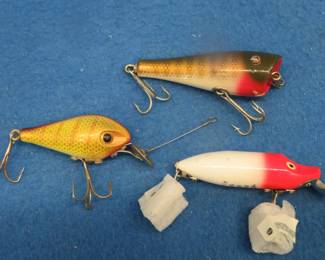 Lot 144. CCBC? 3" wooden Plunker, P&K 2 1/4" Amazing Maise, and a Heddon 3" River Runt Spook Floater