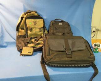 Lot 243. Tactical military backpack, NRA backpack, survival kit, and a computer bag