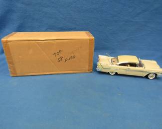 Lot 168. Motor Max 1958 Plymouth Fury. 1:18 scale die-cast car with a box