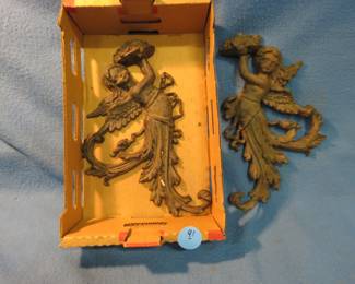 Lot 91. Cast iron wall decorations