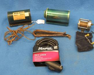Lot 65. Two belt bait boxes, Shakespeare 1920 Wondereel, bike lock and more