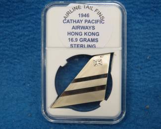 Lot 235. Sterling Silver Tail Fins. 16.9 grams. 1946 Cathay Airways.