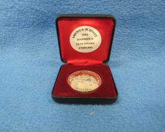 Lot 166. America in Space 1962 Mariner II sterling silver medallion. 25.78 grams. No sales tax on this item.