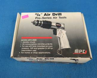 Lot 275. MPC 3/8" air drill. Appears to be new in the box.