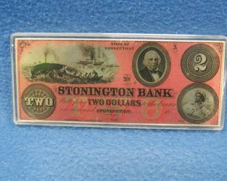 Lot 104. Four troy oz. of .999 silver in a reproduction $2 Stonington Bank Note