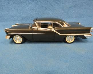 Lot 169. Die-Cast Promotions 1957 Oldsmobile Super 88. 1:18 scale die-cast car.