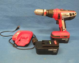 Lot 344. Black & Decker Fire Storm 18-volt drill with 2 batteries and a charger.