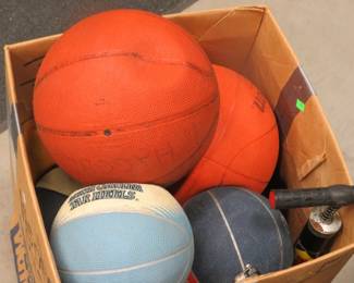 Lot 394. Playground balls needing air and a pump to pump them up