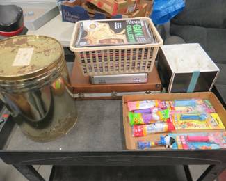 Lot 310. 18-gallon Rubbermaid tote with Gun Collector magazines, shotgun wads/cups, Pez dispensers, and more
