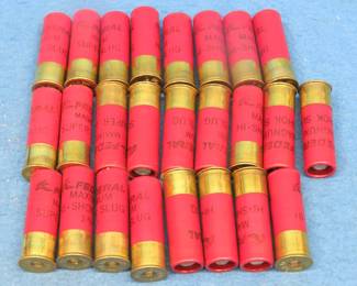 Lot 50. 25 mixed Federal 12-gauge slugs. These were removed by us from the factory boxes that had been ruined by humidity.