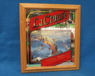 Lot 315. LaCrosse Lager mirror with Mark Susinno artwork. Excellent condition. 19" x 17"
