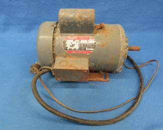 Lot 271. Dayton 115 v electric motor. Untested. Unable to make out any other information.