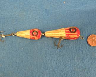 Lot 428. Rare 3 3/4" wooden Double-Header with tack eyes